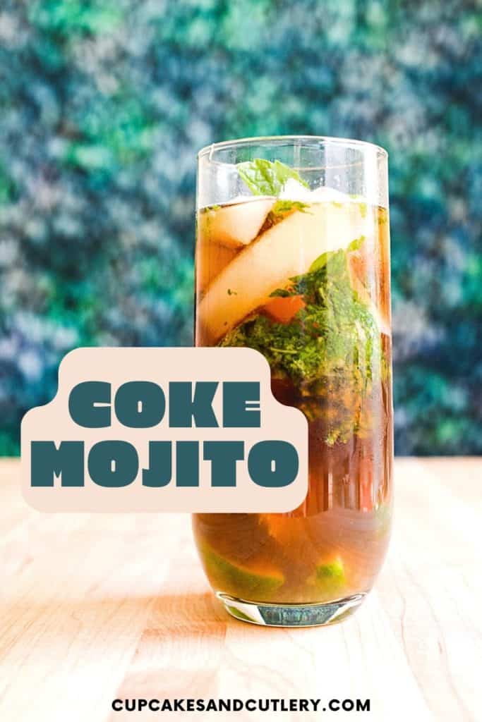 coke Mojito on a wooden cutting board against a green textured background.