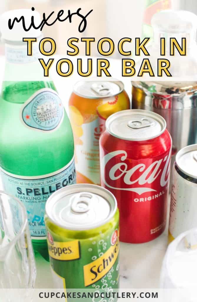 Bottles and cans on a table with text over it that says "mixers to stock in your bar."