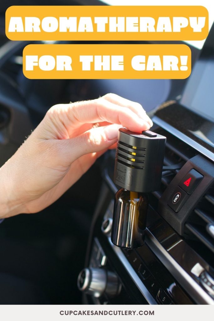 A woman touching her car vent diffuser with text that says "Aromatherapy for the car".