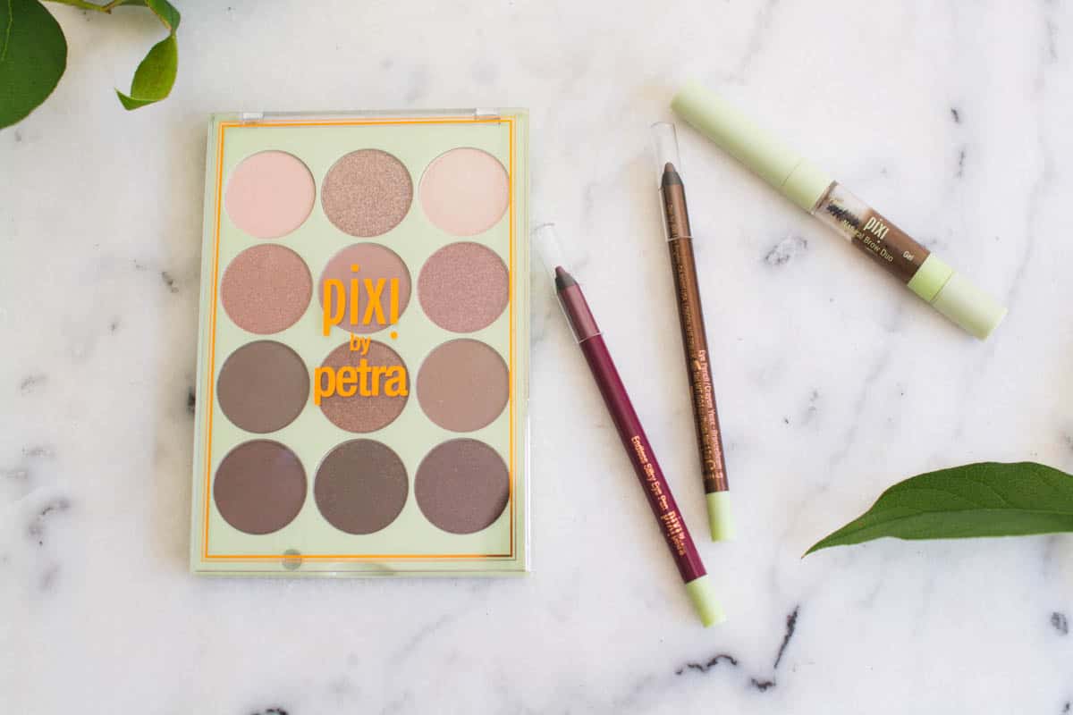 Eye makeup products from Pixi makeup on a table.