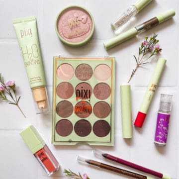 A variety of Pixi beauty products on a table.