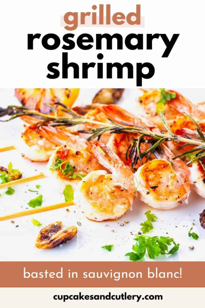 Text - Grilled Rosemary Shrimp basted in sauvignon blanc with skewers of shrimp on a plate.