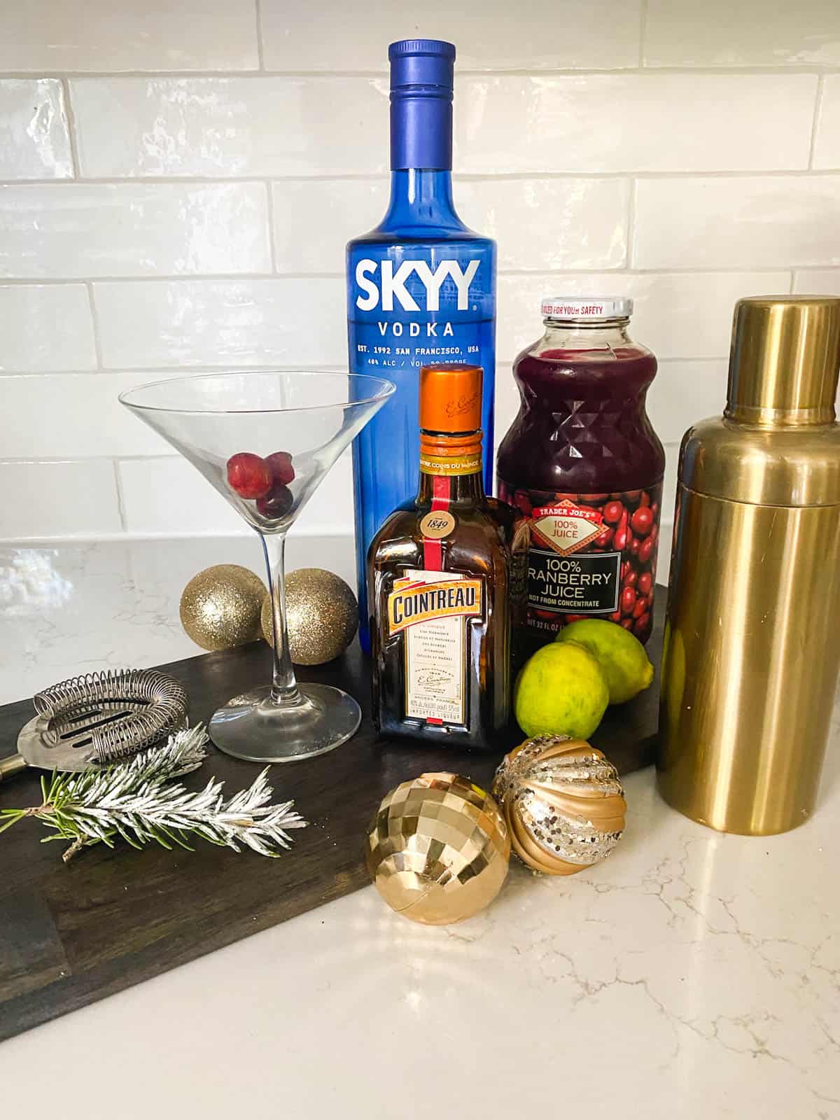 Ingredients to make a Christmas cosmopolitan.