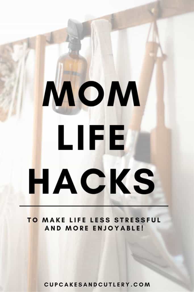Text - Mom Life Hacks over an image of cleaning supplies hanging on a pegged wall.
