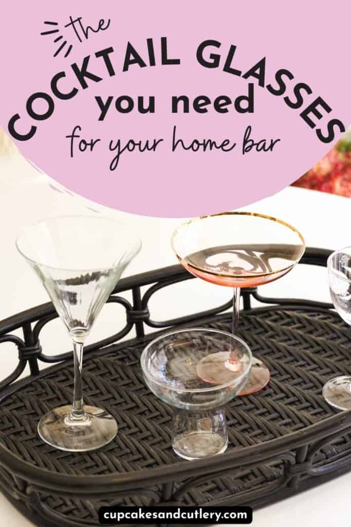Text - The Cocktail Glasses You Need on Your Home Bar with a black tray holding cocktail glasses.