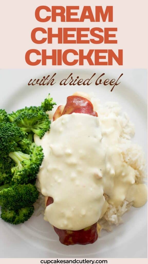 Text: Cream Cheese Chicken with Dried Beef with a baked chicken breast on a plate topped with a cream sauce next to broccoli.