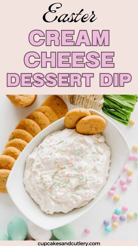 Text: Easter Cream Cheese Dessert Dip with a white serving bowl holding a dip topped with Easter colored sprinkles and cookies next to it.