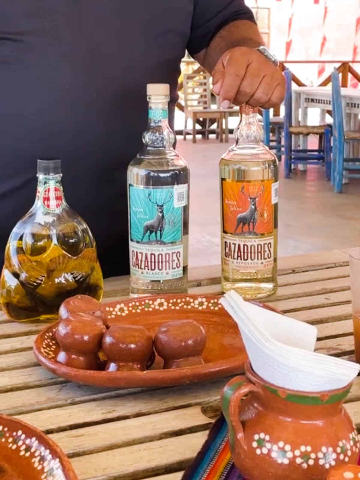 Cazadores blanco and reposado on a table for a tequila tasting.