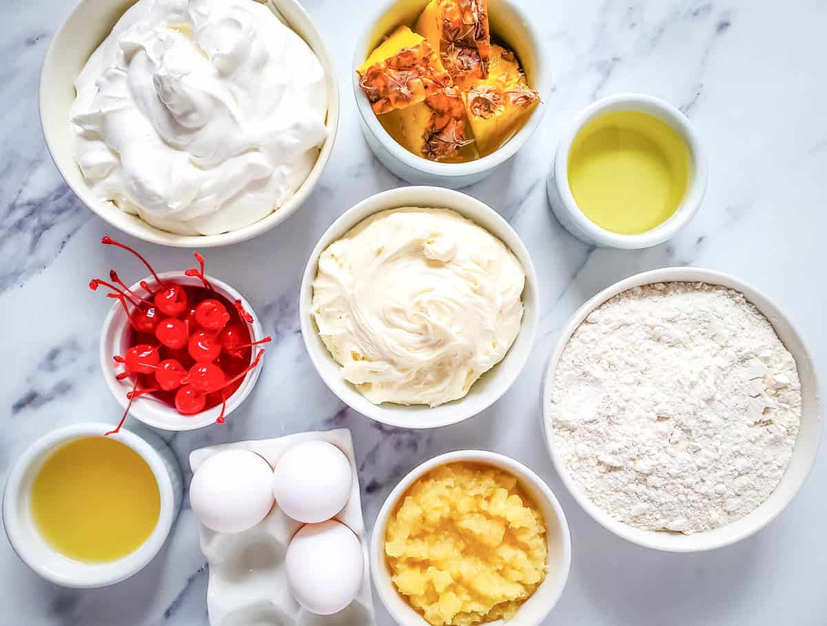 Bowls of the ingredients to make pineapple cupcakes.