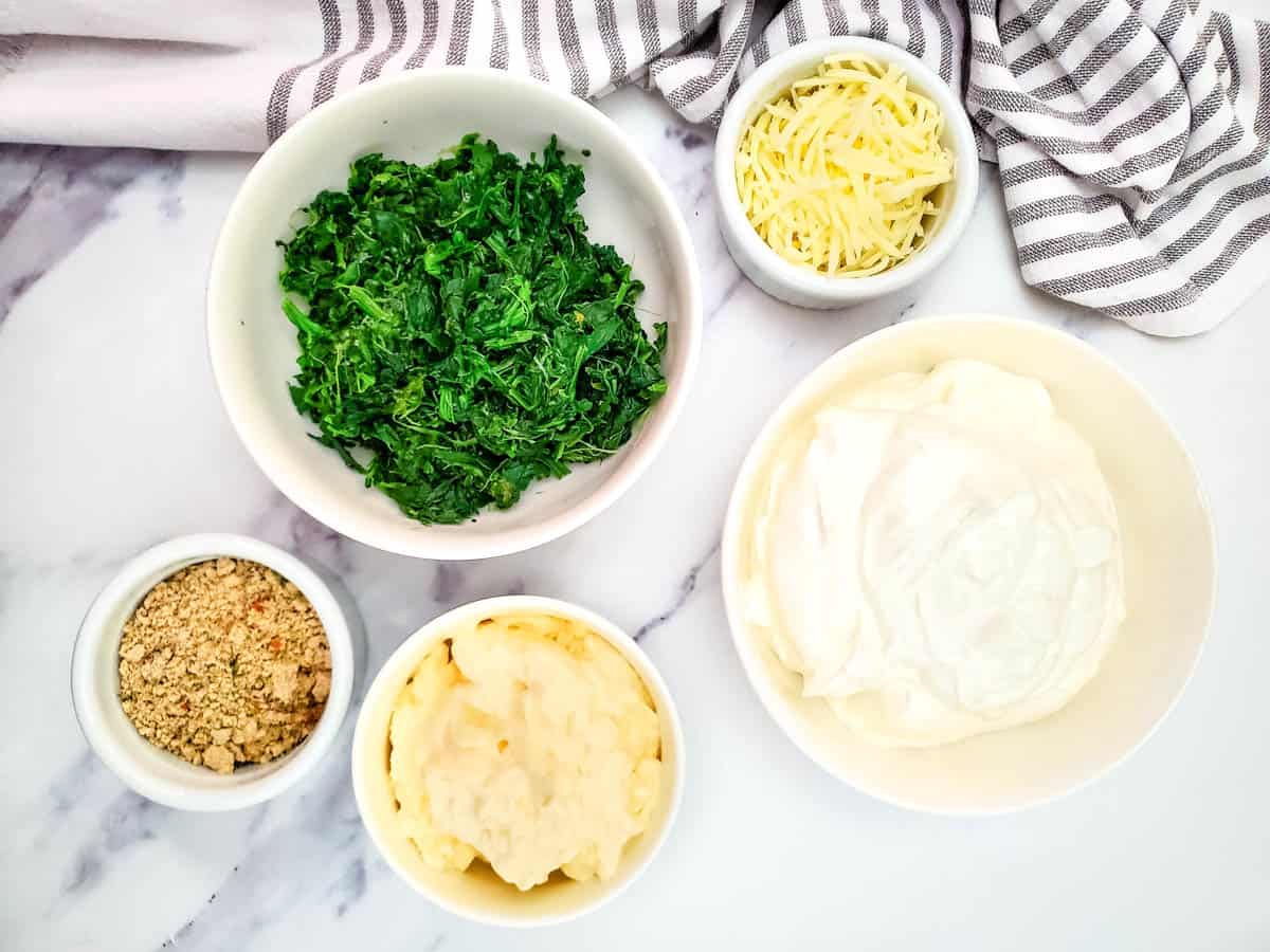 Ingredients to make a spinach dip recipe without artichokes.