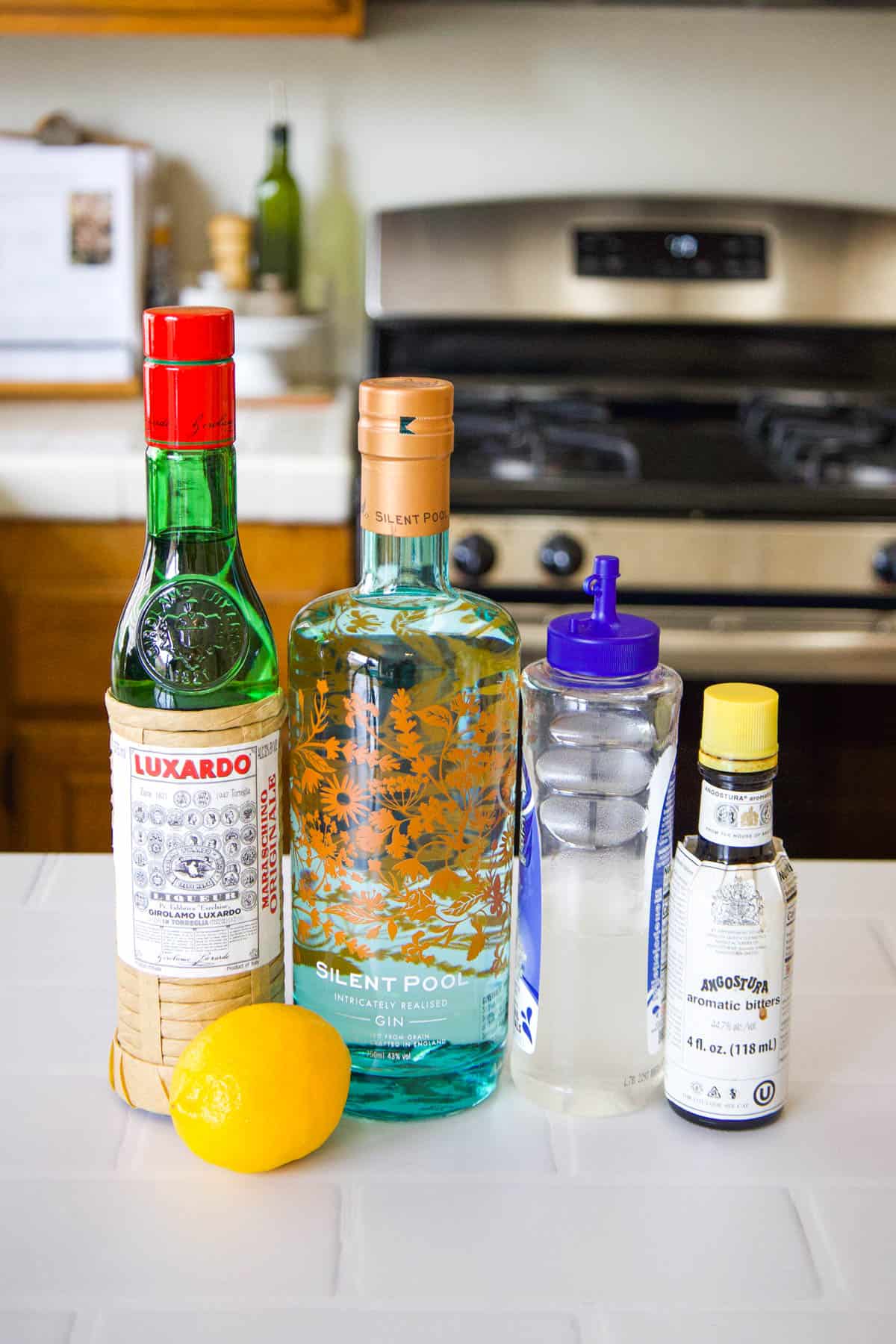 Casino cocktail ingredients on the kitchen countertop.