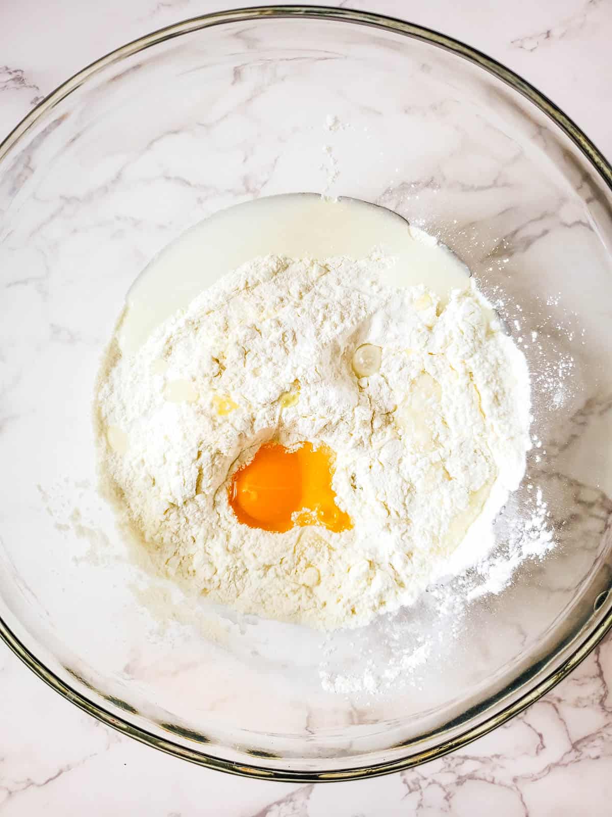 Angel food cake mix cookie ingredients in a mixing bowl.