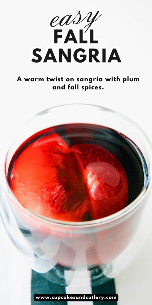 Text: Easy Fall Sangria, A warm twist on sangria with plum and fall spices over an image of a cup holding the sangria.