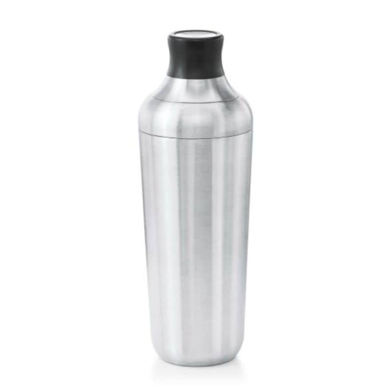 OXO stainless steel cocktail shaker with black lid.