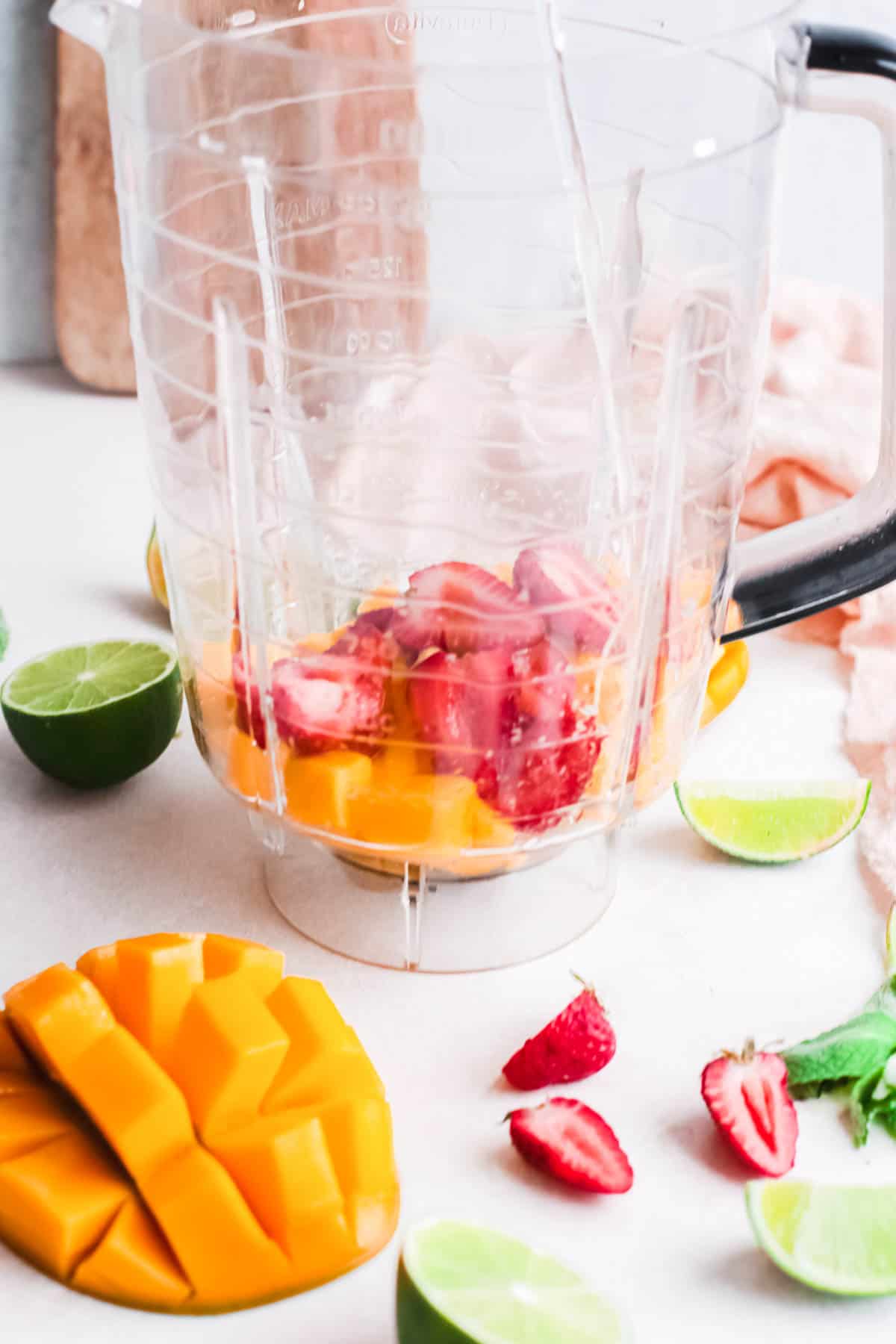 Fruit in the bottom of a blender.