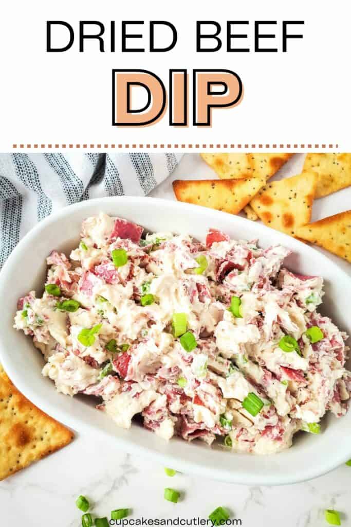 Text: Dried Beef Dip with crackers, a bowl full of armour beef dip, and striped kitchen towel on the side.