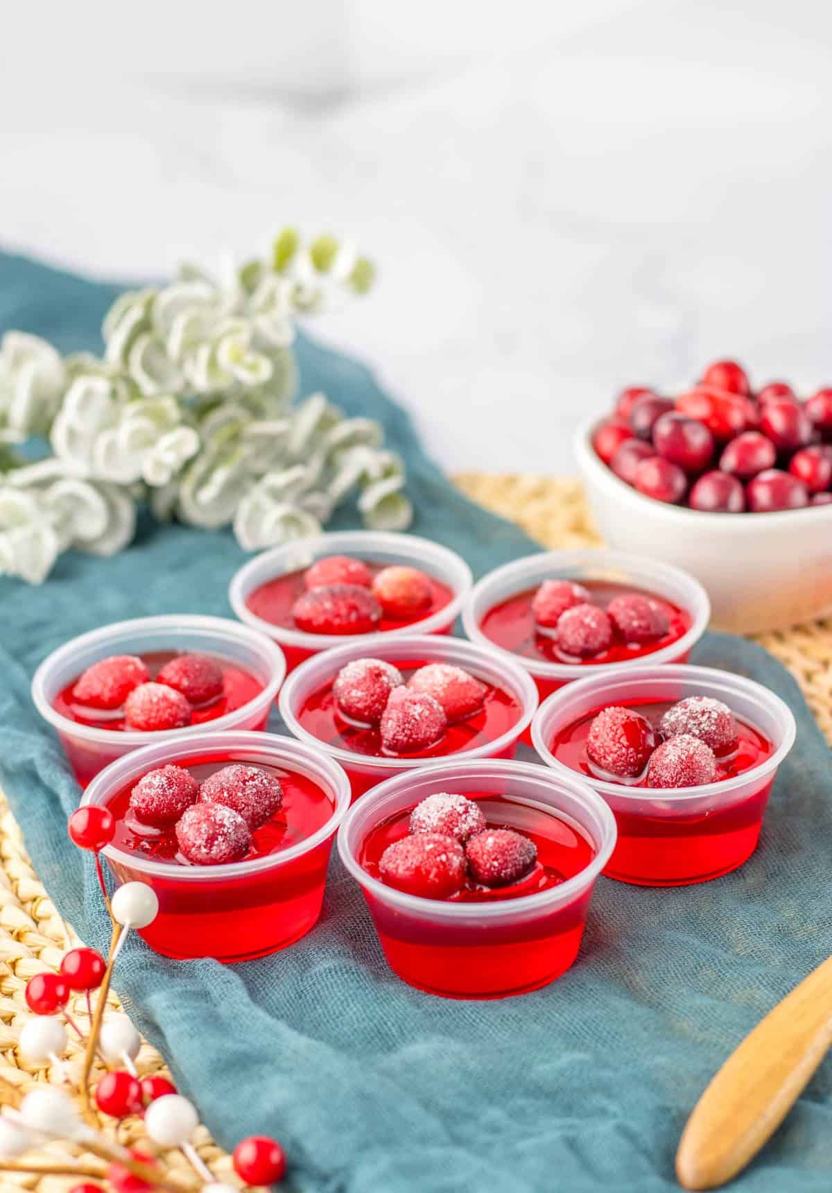 Red jello shots for a winter party made with cranberry jello.