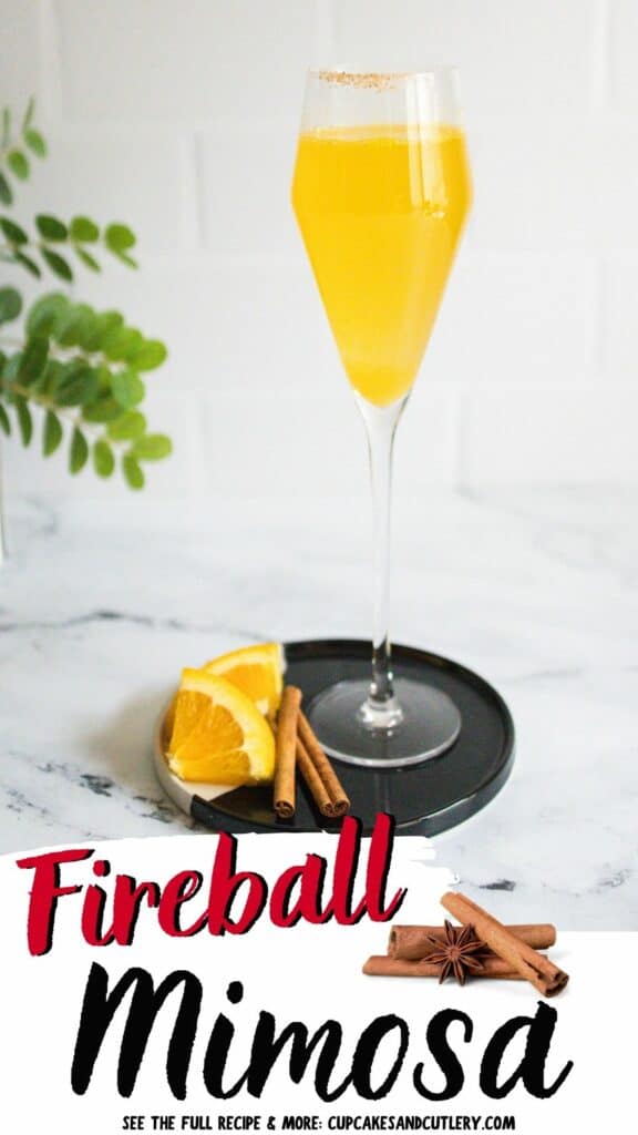 Close up of a fireball mimosa in a champagne flute.