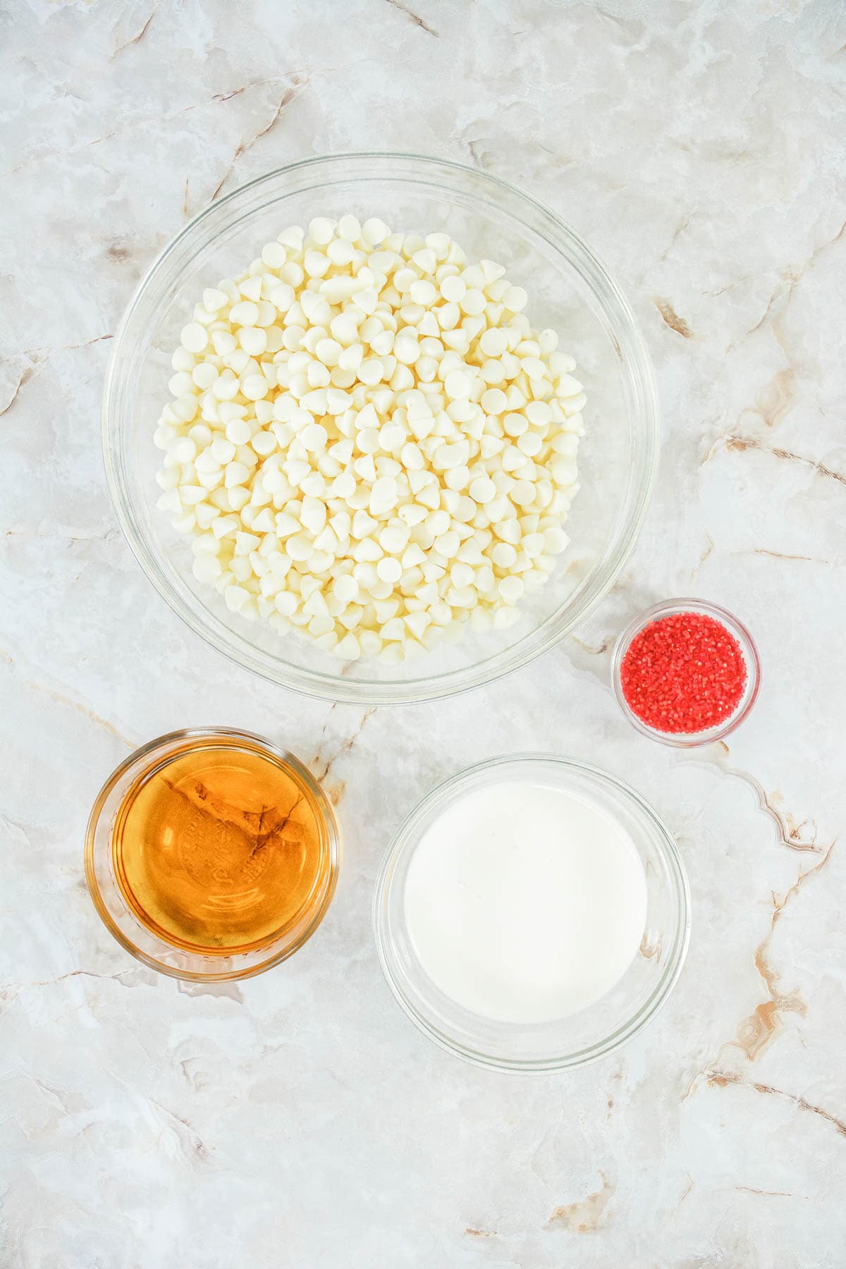 Ingredients to make Fireball White Hot Chocolate Bombs.