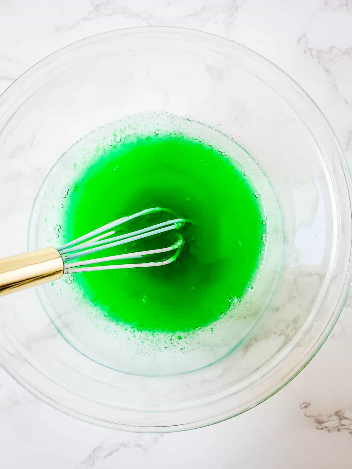 Whisking the lime gelatin.