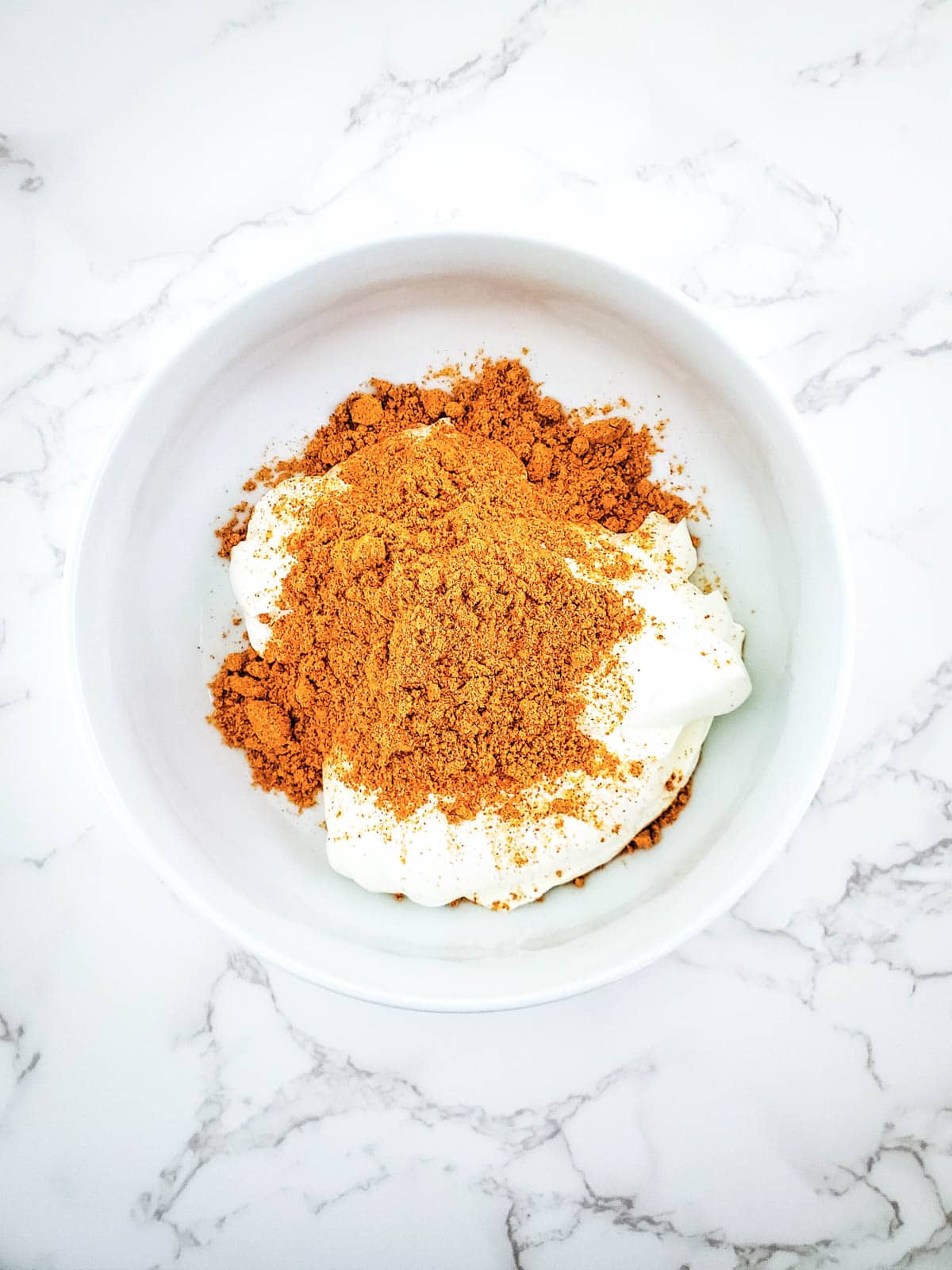 Mix sour cream and taco seasoning in a bowl.