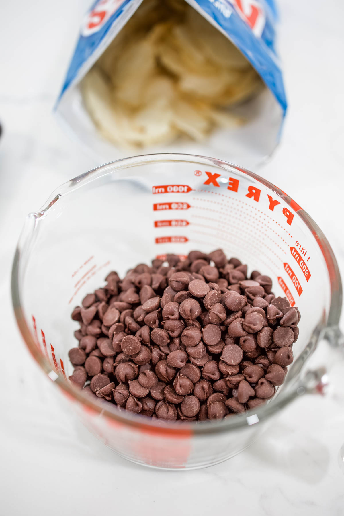 Chocolate chips Chocolate chips in a glass measuring cup.