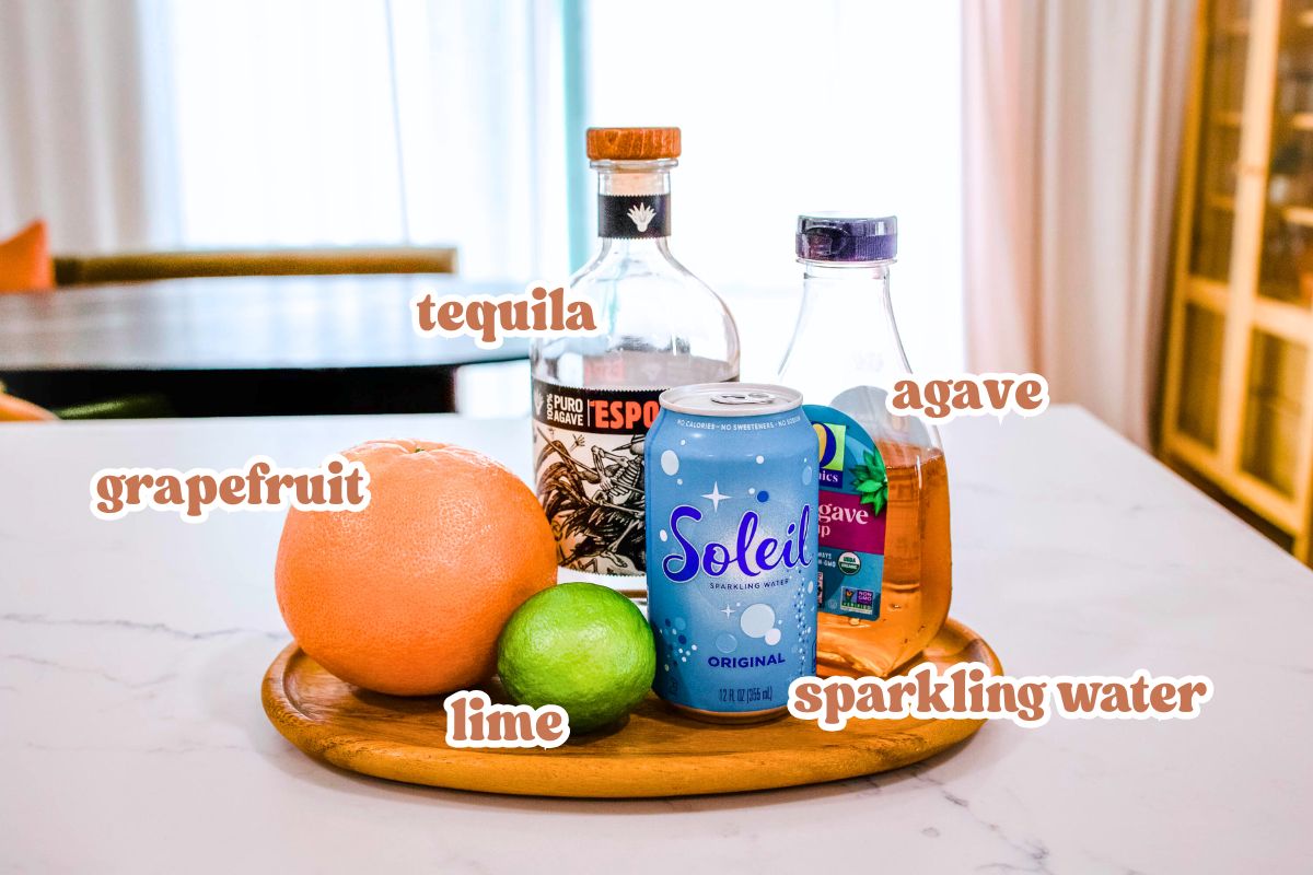 Paloma cocktail ingredients Text: Labeled ingredients to make an easy Paloma cocktail.